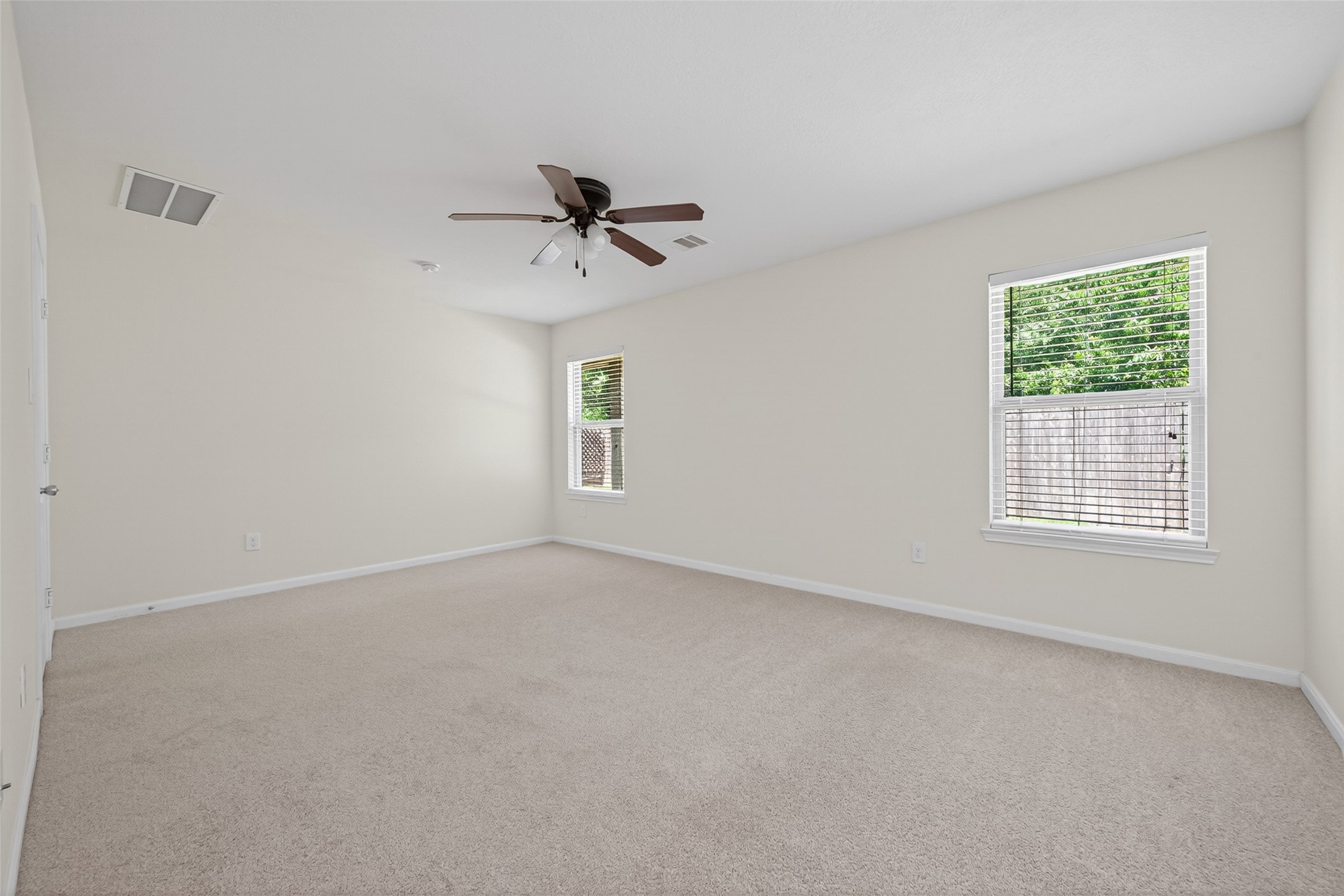 2754 Cayden Creek Way Conroe, TX 77304 - Photo 24 of 40 a view of an empty room with a window