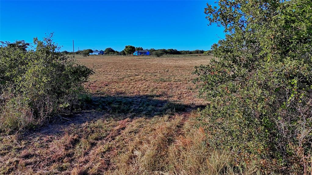 4678 Fenoglio Road Montague, TX 76251 - Photo 14 of 20 a view of a large body of water with a building in the background