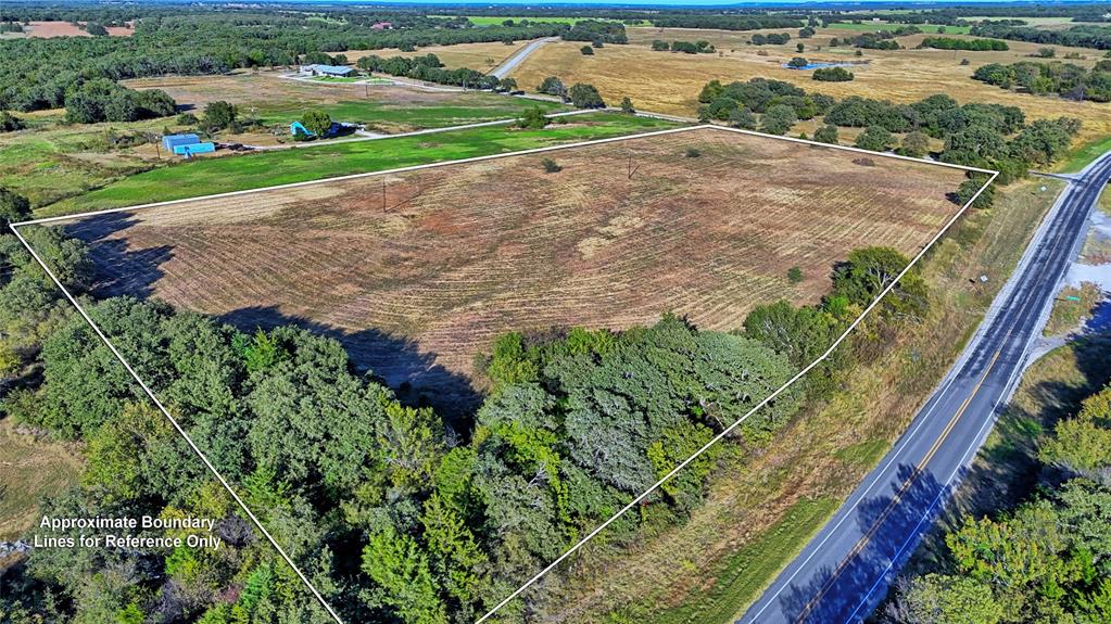 4678 Fenoglio Road Montague, TX 76251 - Photo 3 of 20 a view of a garden with a pathway