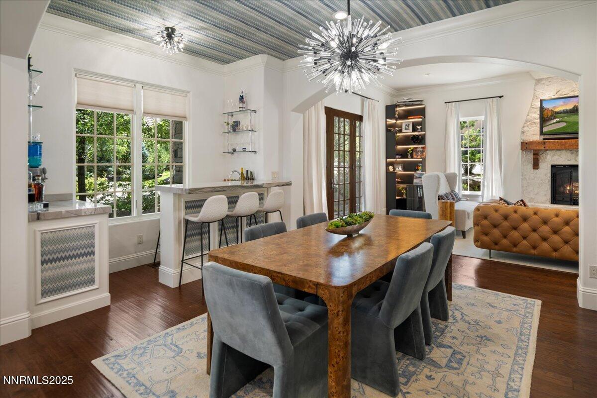 6360 Wetzel Court Reno, NV 89511 - Photo 11 of 43 a view of a dining room with furniture window and wooden floor