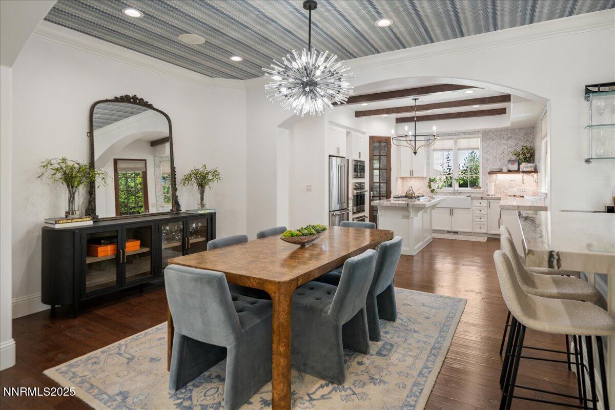6360 Wetzel Court Reno, NV 89511 - Photo 12 of 43 a view of a dining room with furniture window and wooden floor