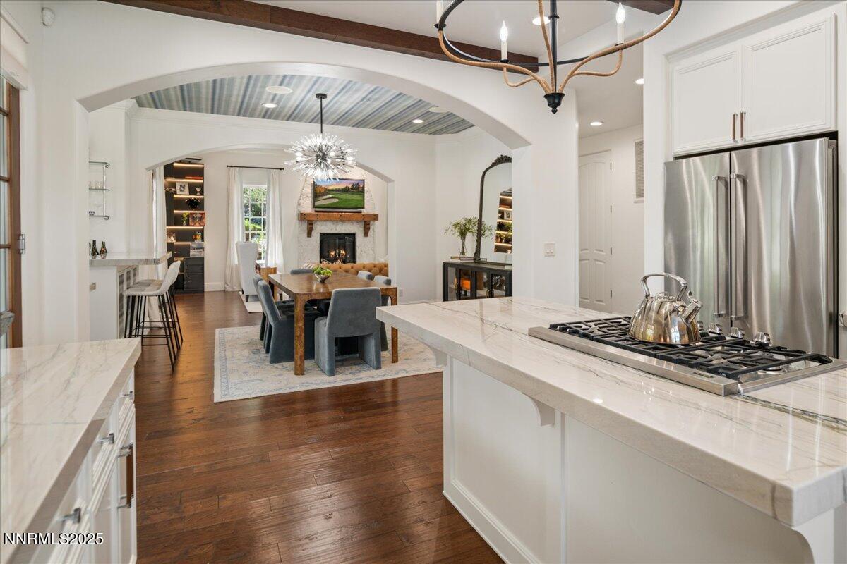 6360 Wetzel Court Reno, NV 89511 - Photo 14 of 43 a dining hall with stainless steel appliances granite countertop a stove and refrigerator