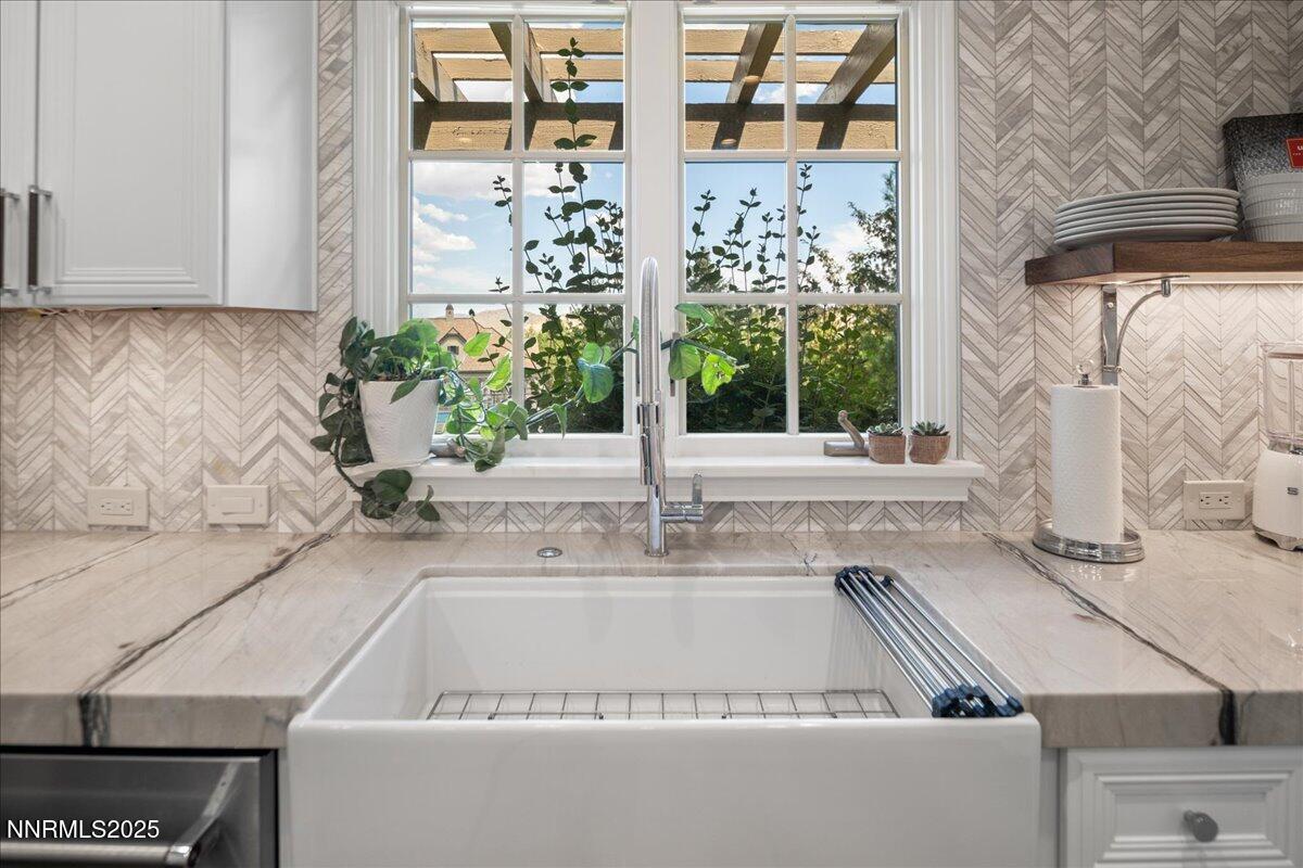 6360 Wetzel Court Reno, NV 89511 - Photo 19 of 43 a kitchen with a sink and a window