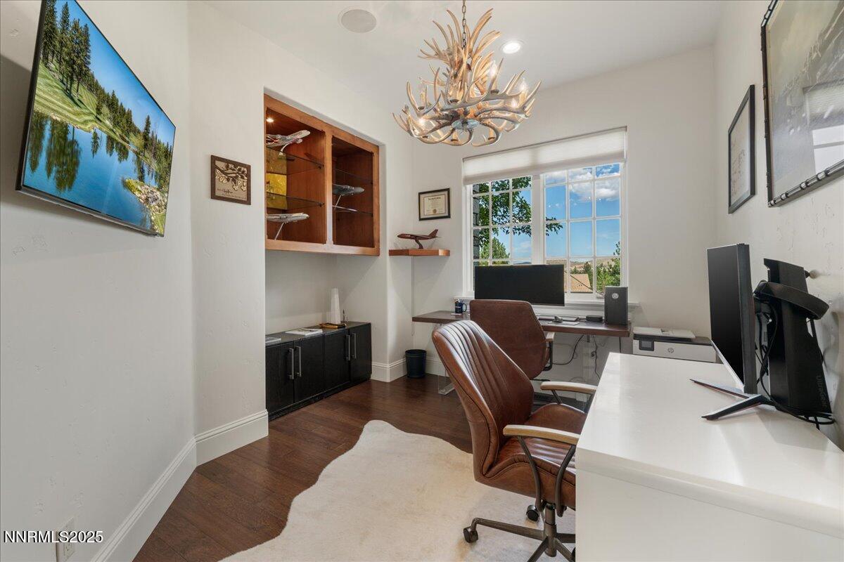 6360 Wetzel Court Reno, NV 89511 - Photo 20 of 43 a view of a workspace with furniture and a chandelier