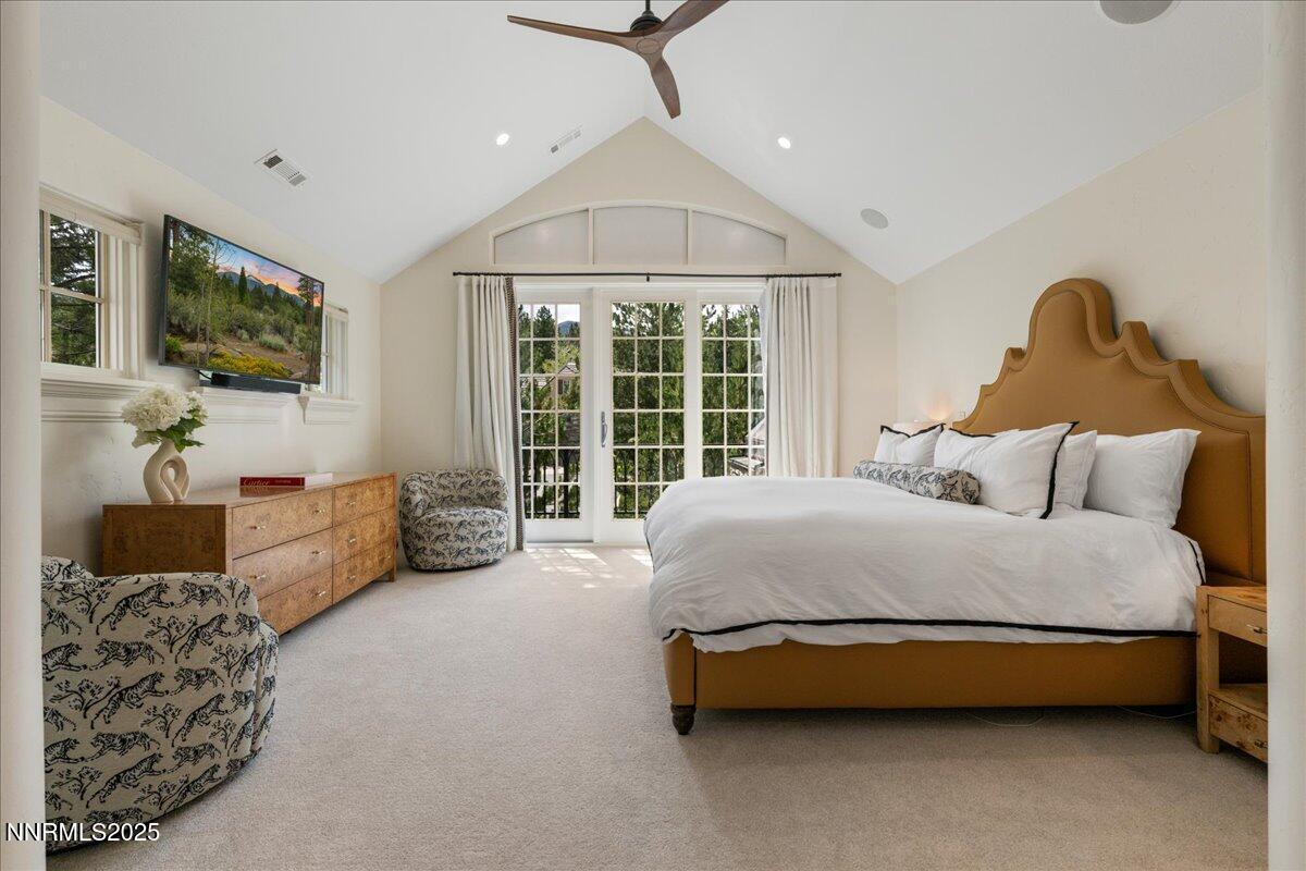 6360 Wetzel Court Reno, NV 89511 - Photo 23 of 43 a bed room with a bed and a couch