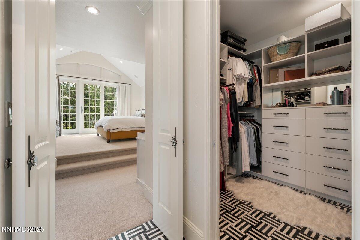 6360 Wetzel Court Reno, NV 89511 - Photo 27 of 43 a view of walk in closet with clothes and shoes