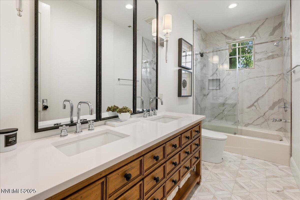 6360 Wetzel Court Reno, NV 89511 - Photo 33 of 43 a bathroom with a sink and a mirror