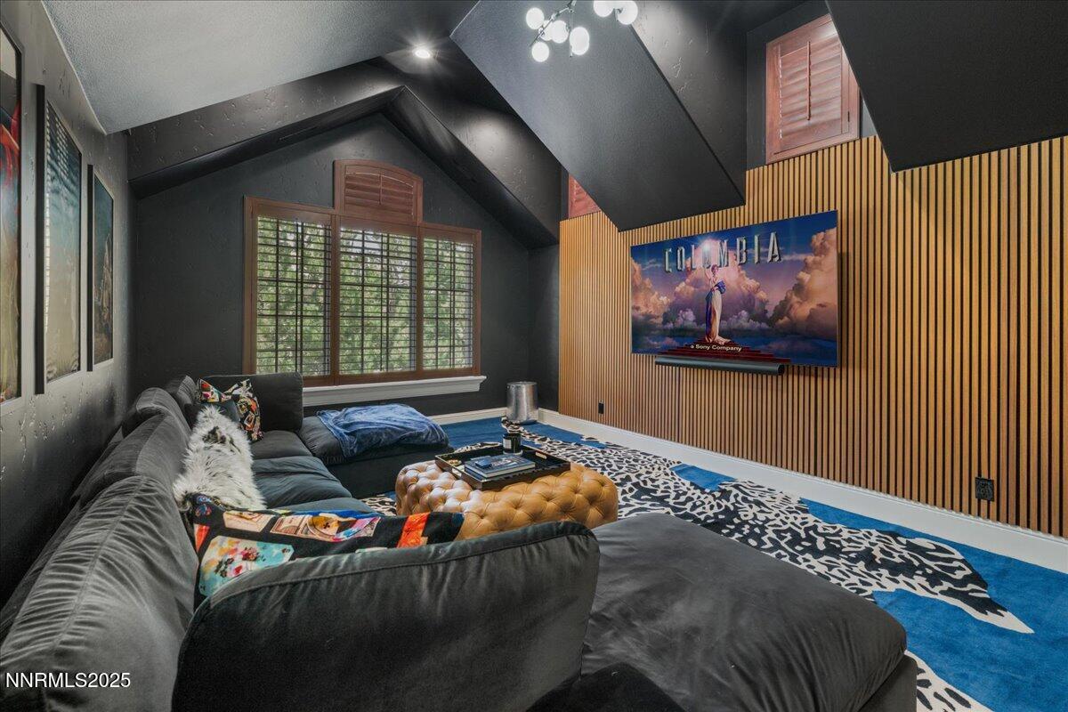 6360 Wetzel Court Reno, NV 89511 - Photo 34 of 43 a living room with furniture and a flat screen tv