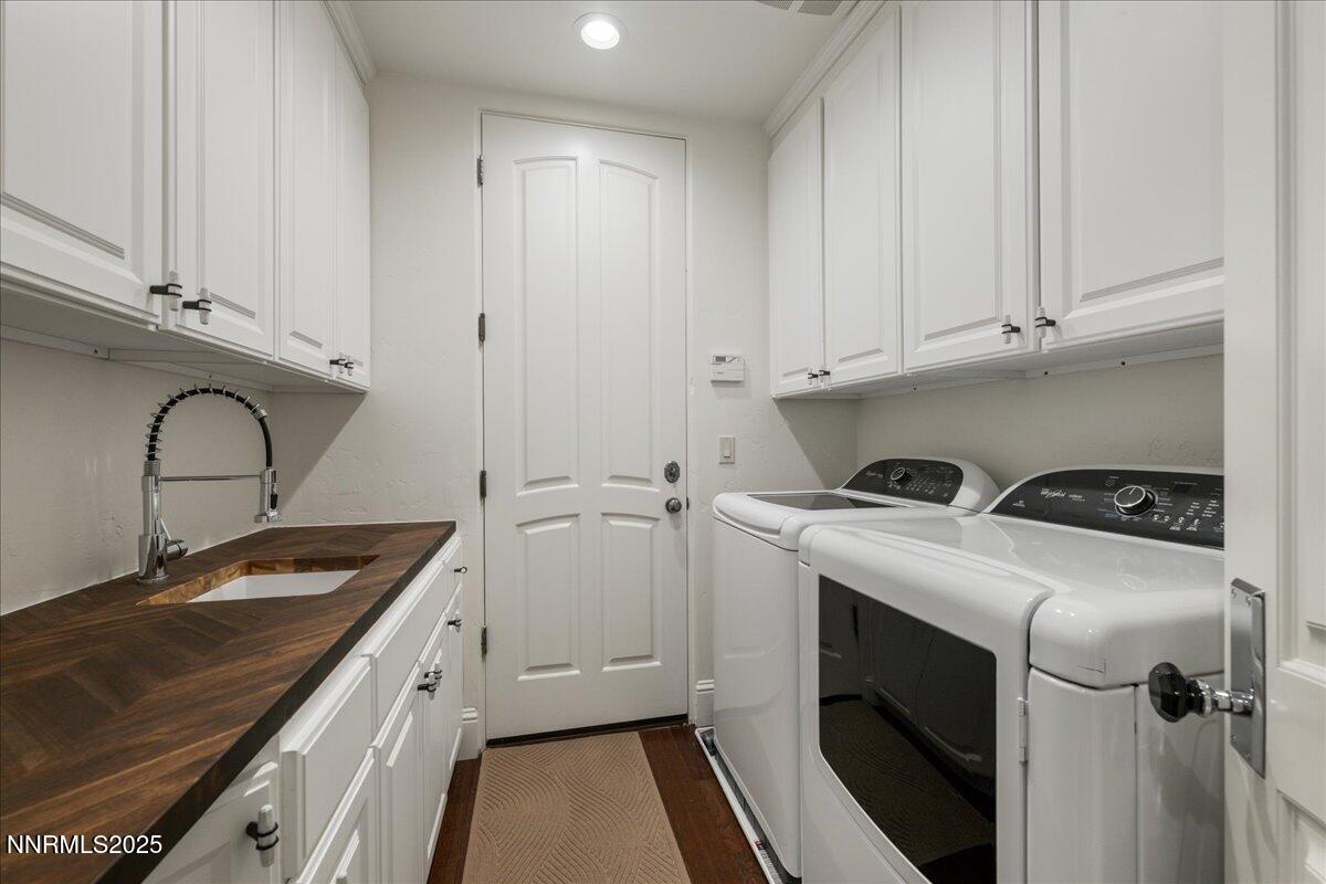6360 Wetzel Court Reno, NV 89511 - Photo 36 of 43 a utility room with sink dryer and washer