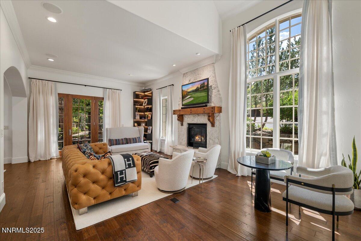 6360 Wetzel Court Reno, NV 89511 - Photo 6 of 43 a living room with furniture and a fireplace