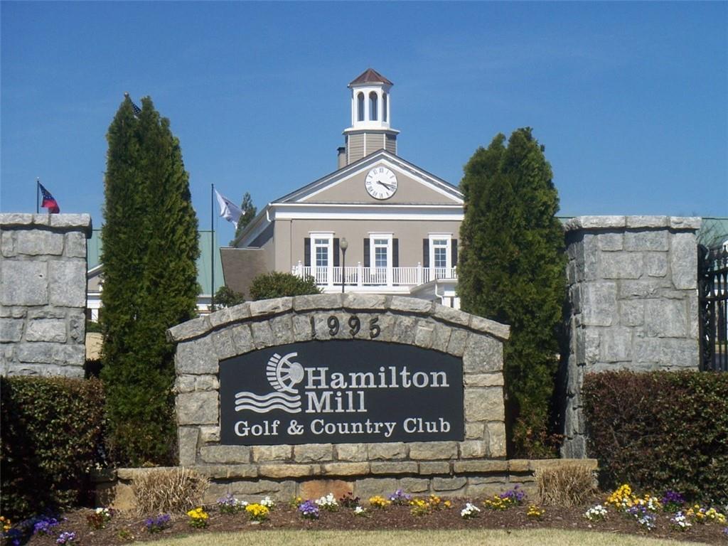 3265 Thimbleberry Trail Dacula, GA 30019 - Photo 59 of 61 a view of front of a house with a sign board