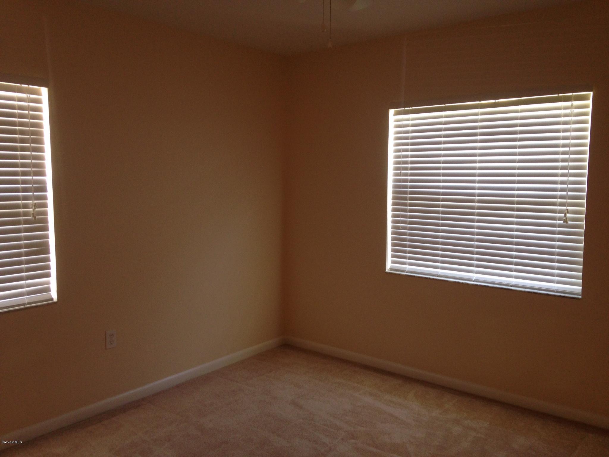 1025 Trinidad Road Cocoa Beach, FL 32931 - Photo 21 of 25 a view of a room that has a window in it
