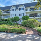 a front view of multi story residential apartment building
