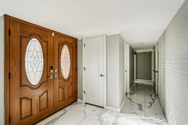 a view of a hallway with painted walls