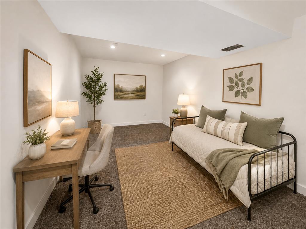 3104 Moyer Road Hellertown, PA 18055 - Photo 19 of 30 Recessed lighting illuminates this versatile lower level space finished with wall-to-wall carpeting.