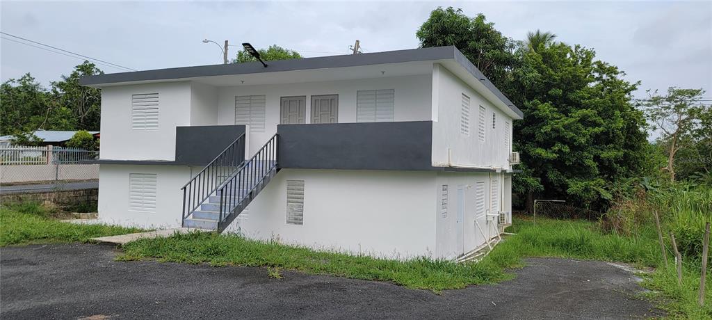 a house view with a garden space