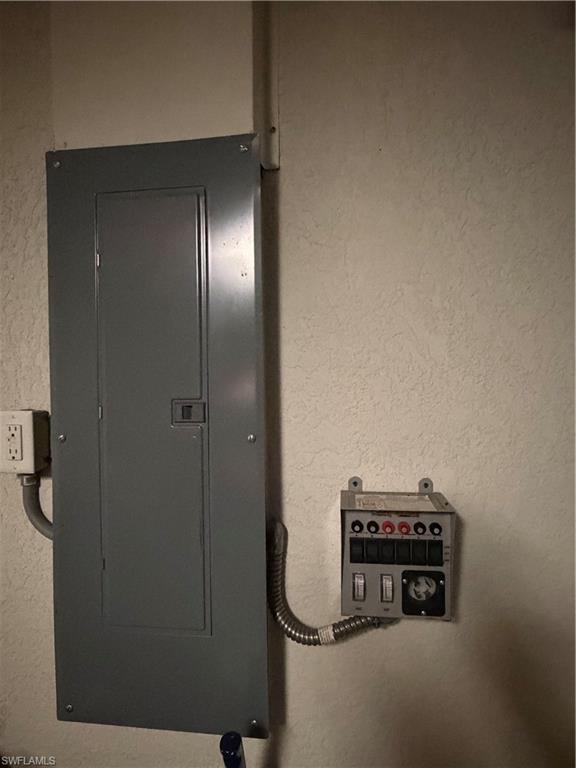 7264 Salerno Court Naples, FL 34114 - Photo 25 of 45 Utilities featuring electric panel