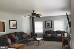9409 Fooks Road Bishopville, MD 21813 - Photo 2 of 31 Living area w/wood stove