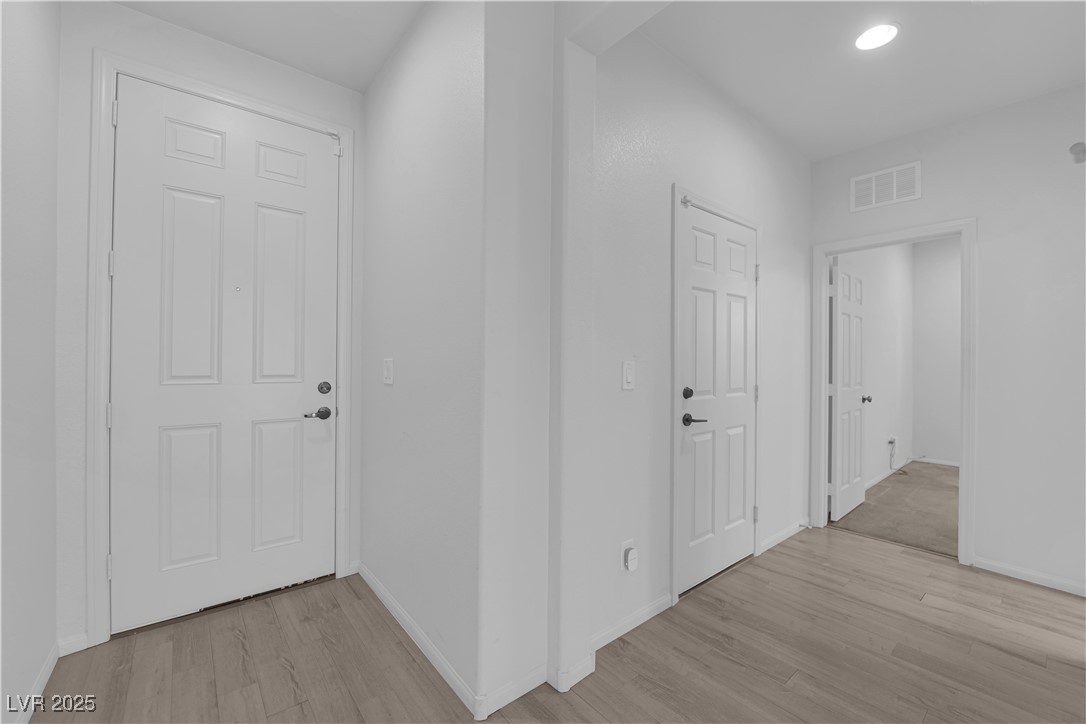 9205 Keystone Ridge Avenue Las Vegas, NV 89148 - Photo 16 of 40 Hall featuring light wood-style floors and recessed lighting