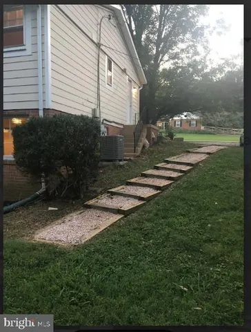 a view of a backyard with green space