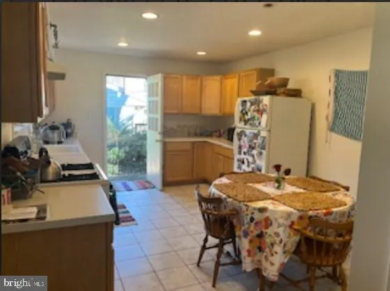 a bed room with a bed furniture and a flat screen tv