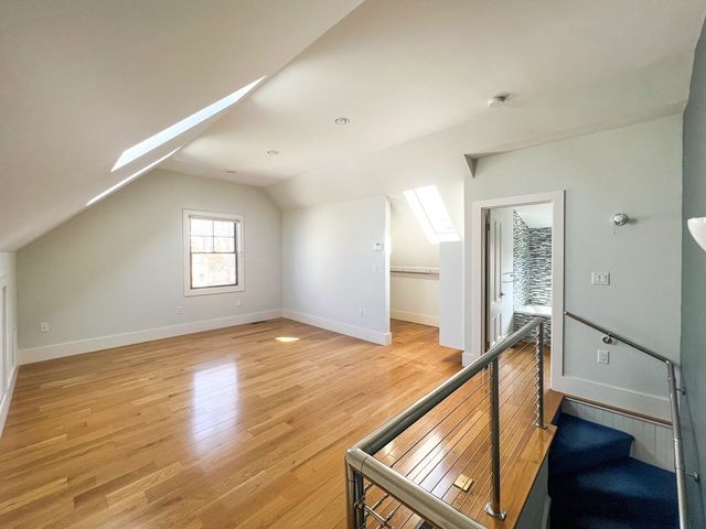a view of an empty room and glass door