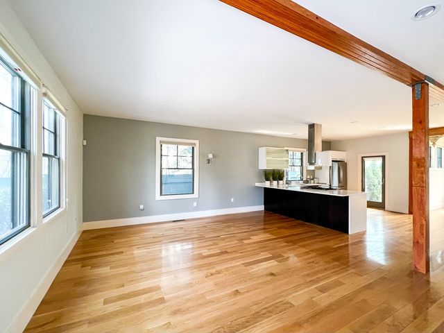 a big room with wooden floor