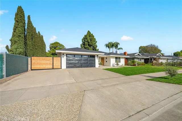 front view of house with a yard