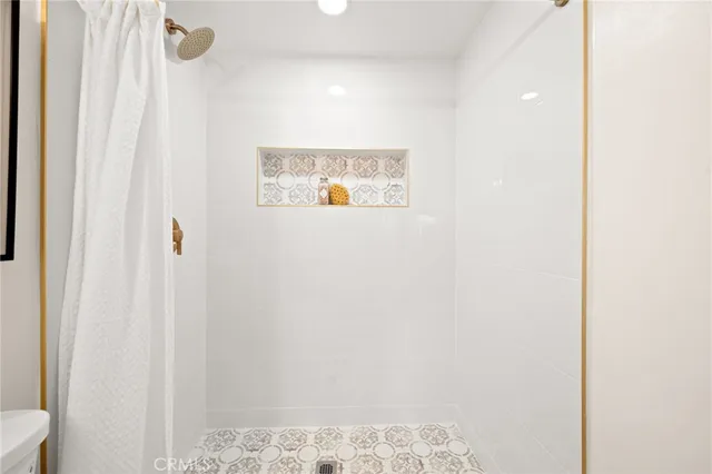 an empty room with fan