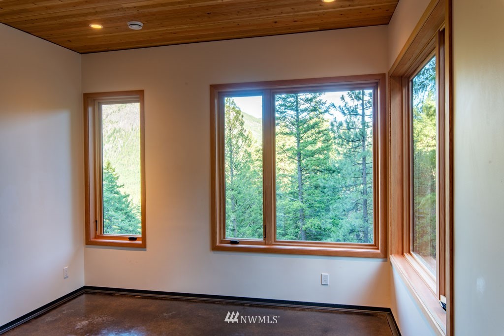 39 Bitterbrush Road Winthrop, WA 98862 - Photo 21 of 40 a view of an empty room with a window