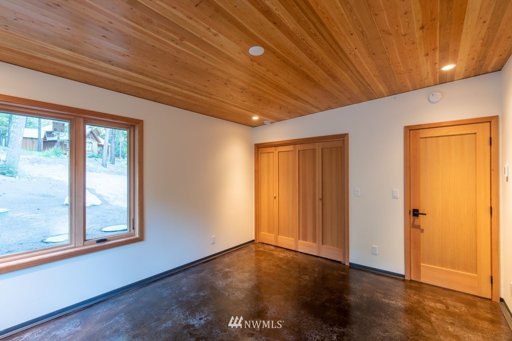 39 Bitterbrush Road Winthrop, WA 98862 - Photo 25 of 40 a view of livingroom with an empty space and a window