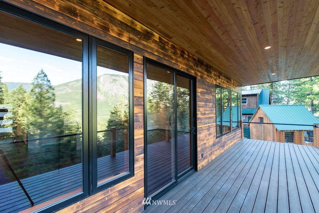39 Bitterbrush Road Winthrop, WA 98862 - Photo 28 of 40 a view of a balcony with wooden floor