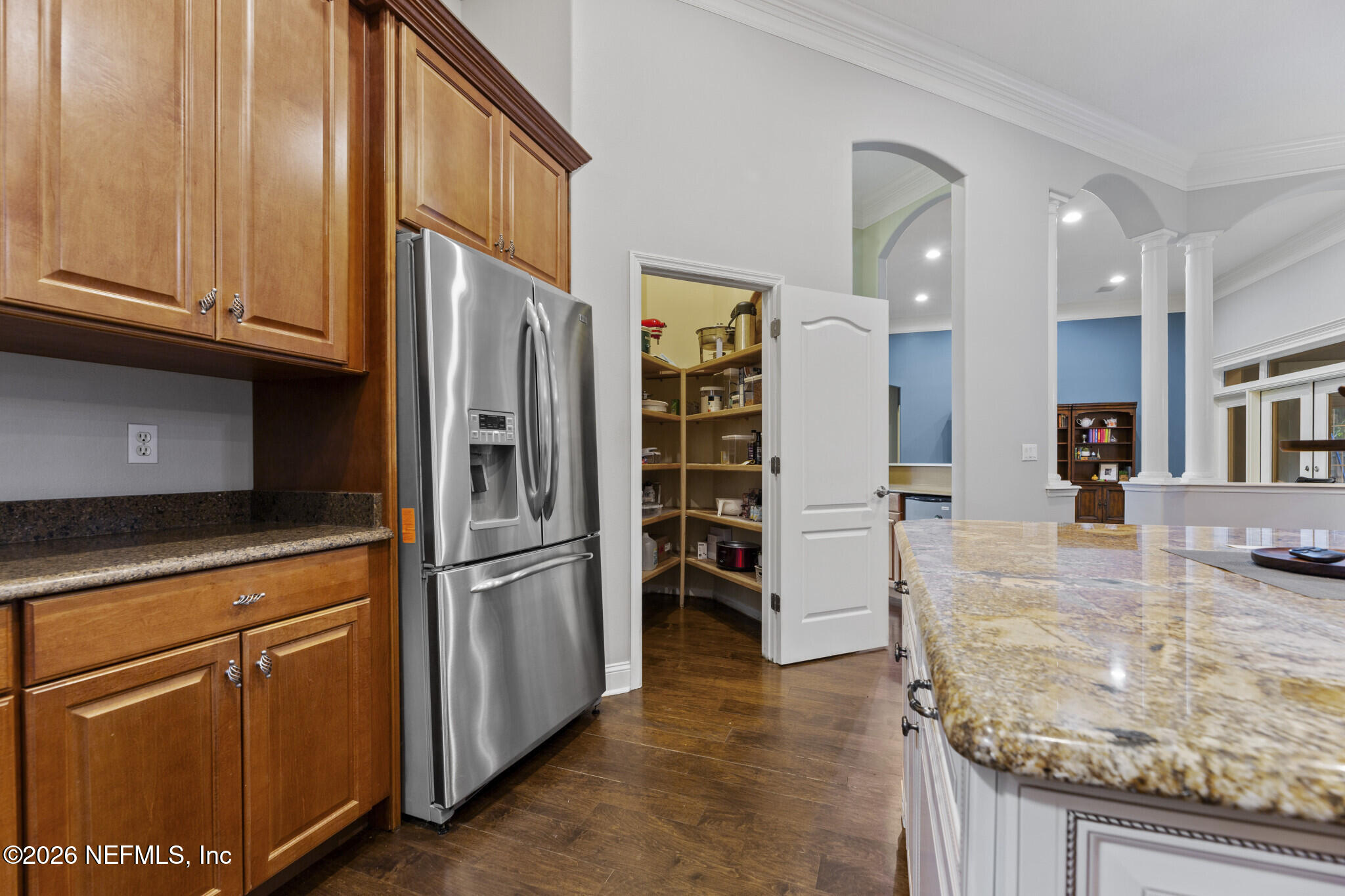 1478 Kathleen Way Fleming Island, FL 32003 - Photo 12 of 35 a kitchen with stainless steel appliances granite countertop a refrigerator and a sink
