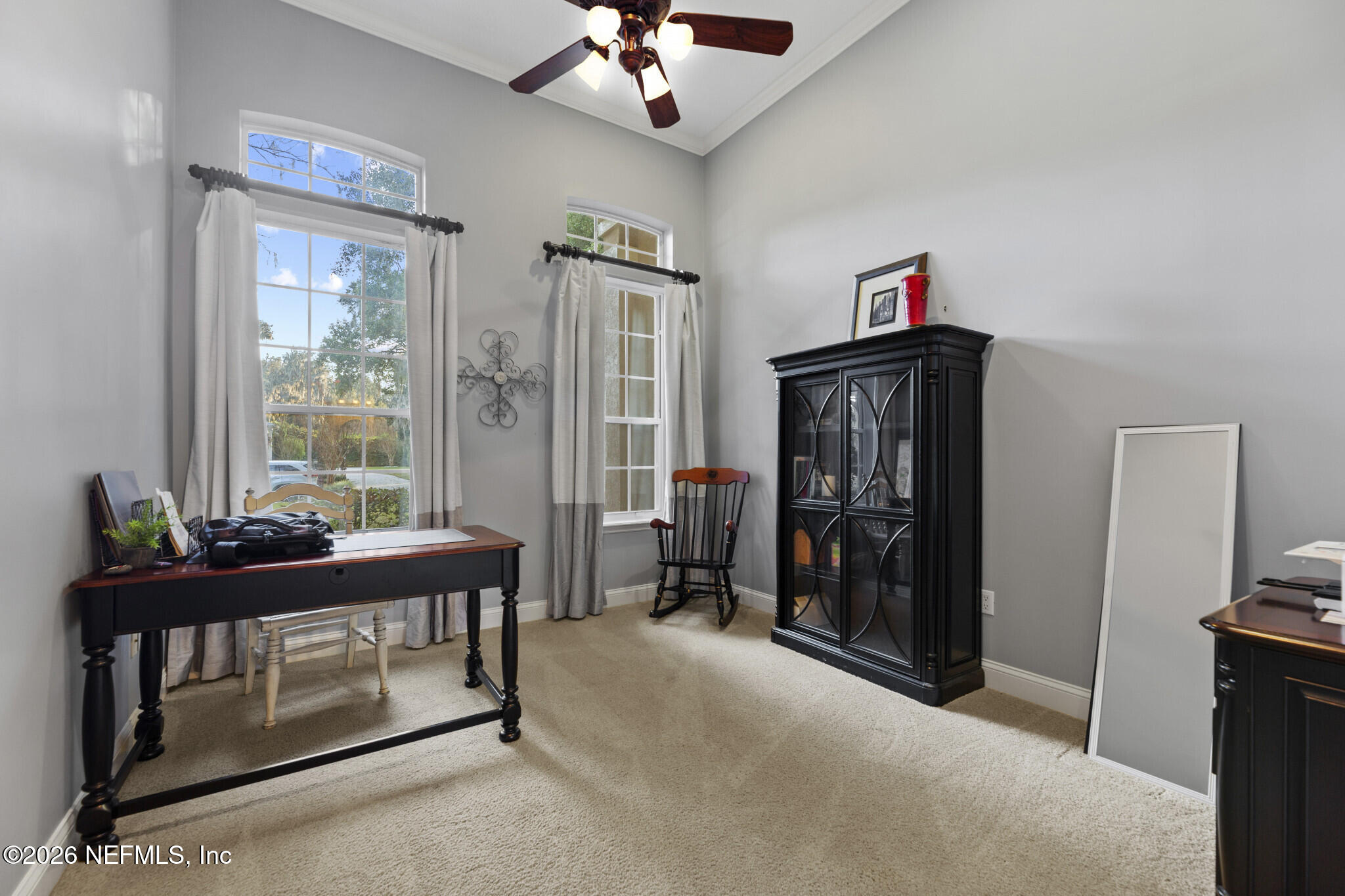 1478 Kathleen Way Fleming Island, FL 32003 - Photo 26 of 35 a living room with furniture and a flat screen tv