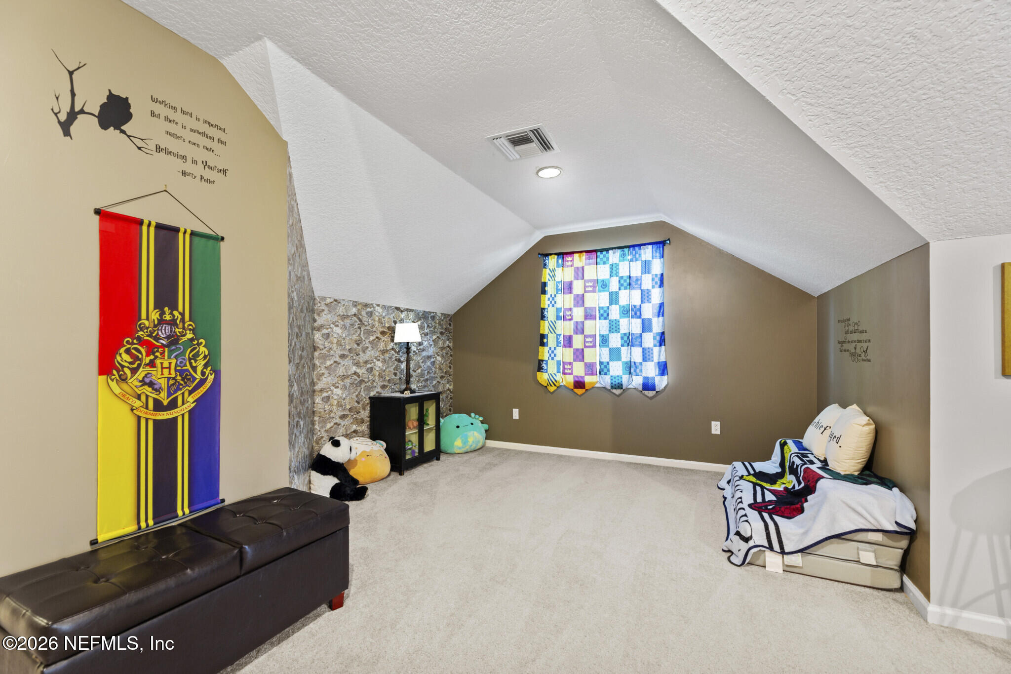 1478 Kathleen Way Fleming Island, FL 32003 - Photo 30 of 35 a living room with furniture and a chandelier