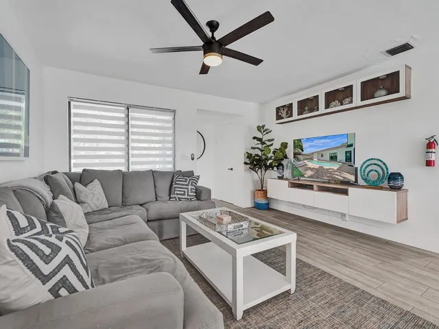 a room with pool and checkered floor