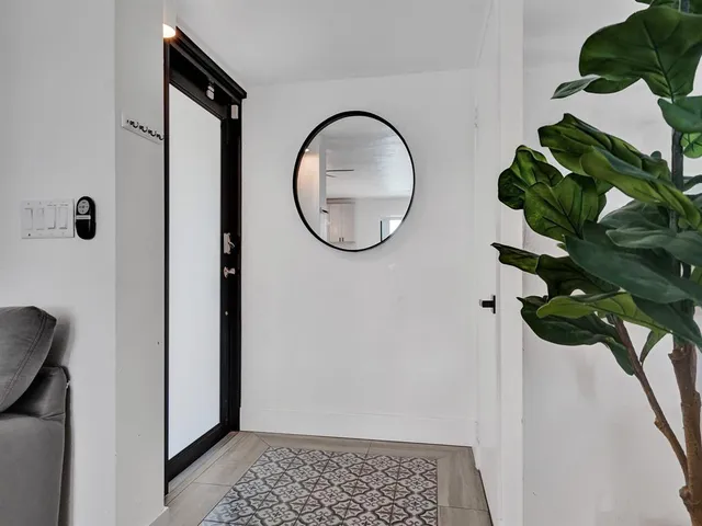 a house view with a backyard space