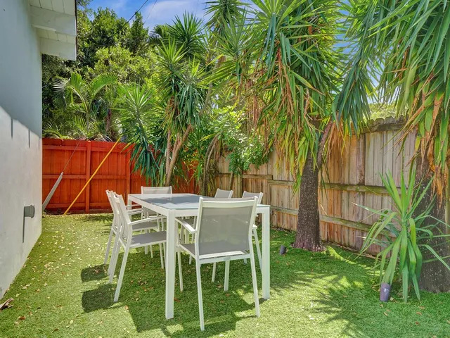 an aerial view of a house having yard