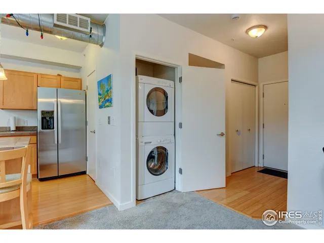 a view of a storage & utility room with washer and dryer
