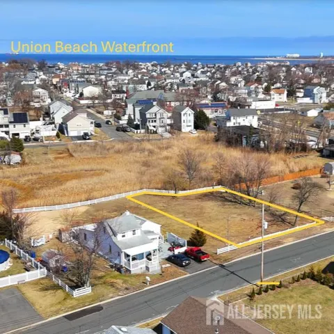 a view of a balcony with an ocean