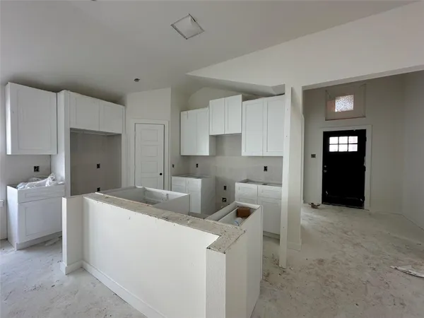 a view of a kitchen sink and dishwasher