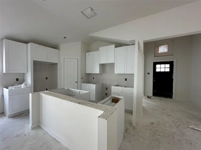 a view of a kitchen sink and dishwasher