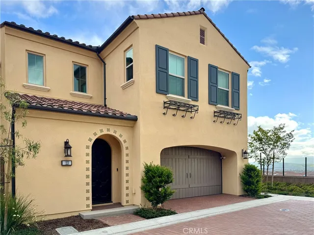 a front view of a house with yard