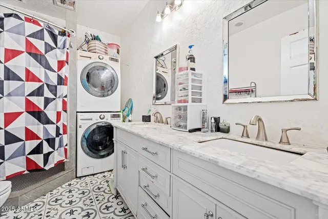an aerial view of a residential apartment building with swimming pool