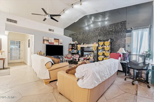 a white bath tub sitting in a bathroom next to a window