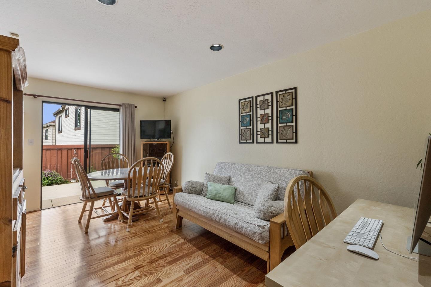 360 Winwood Avenue Pacifica, CA 94044 - Photo 11 of 26 a living room with furniture and a wooden floor