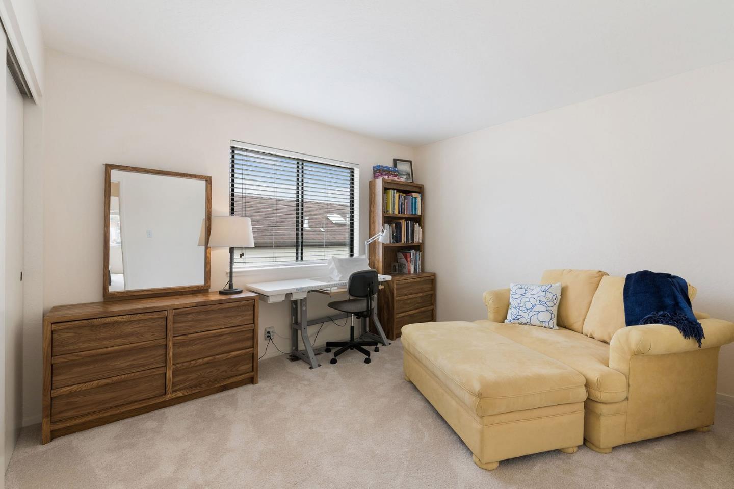 360 Winwood Avenue Pacifica, CA 94044 - Photo 22 of 26 a bedroom with a bed and a dresser