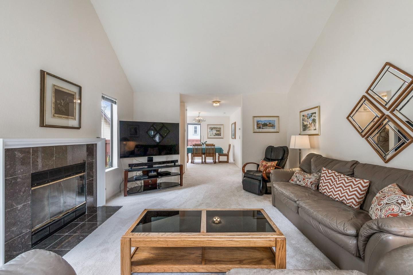360 Winwood Avenue Pacifica, CA 94044 - Photo 7 of 26 a living room with furniture and a fireplace