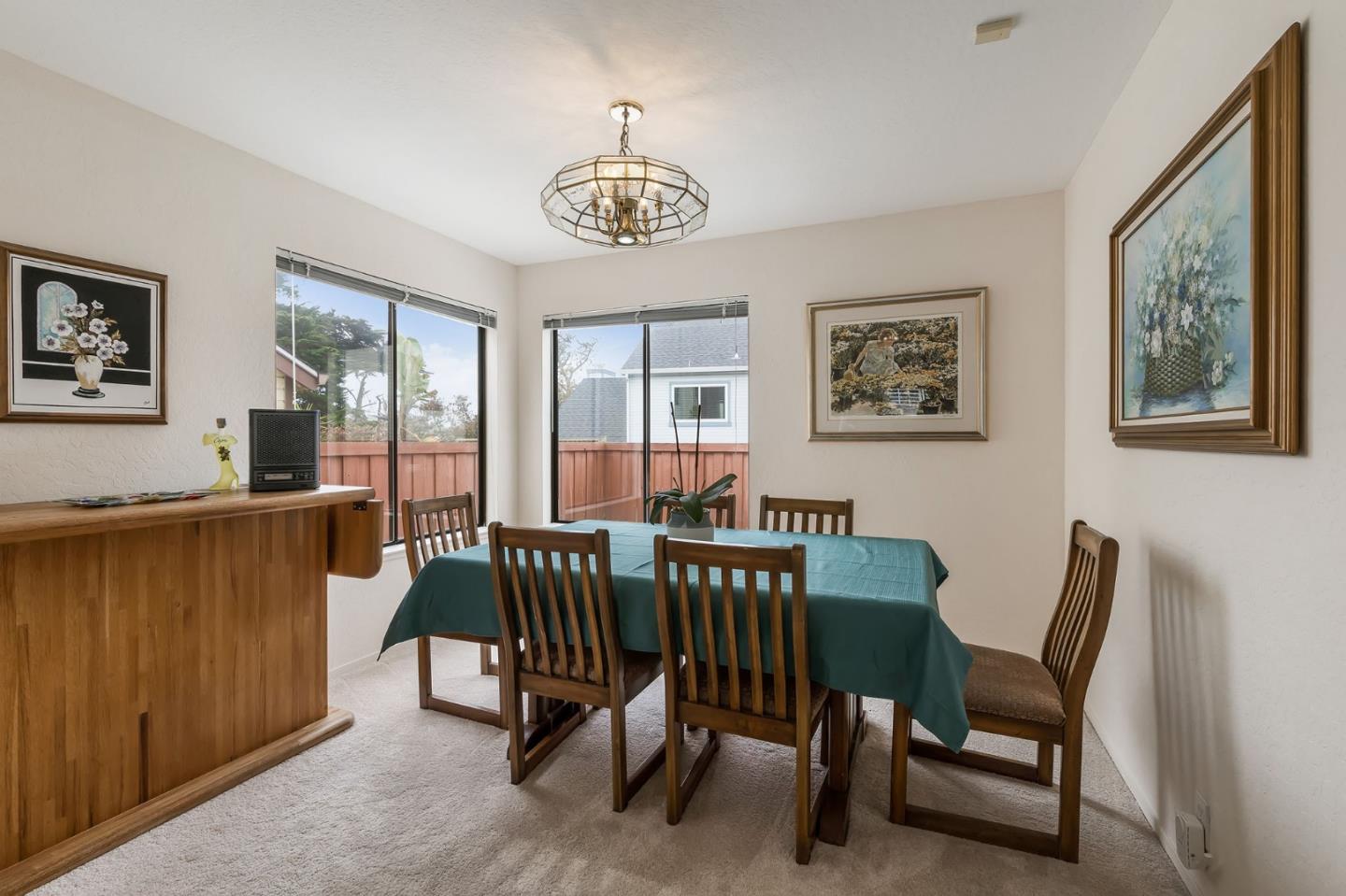 360 Winwood Avenue Pacifica, CA 94044 - Photo 9 of 26 a view of a dining room with furniture window and outside view