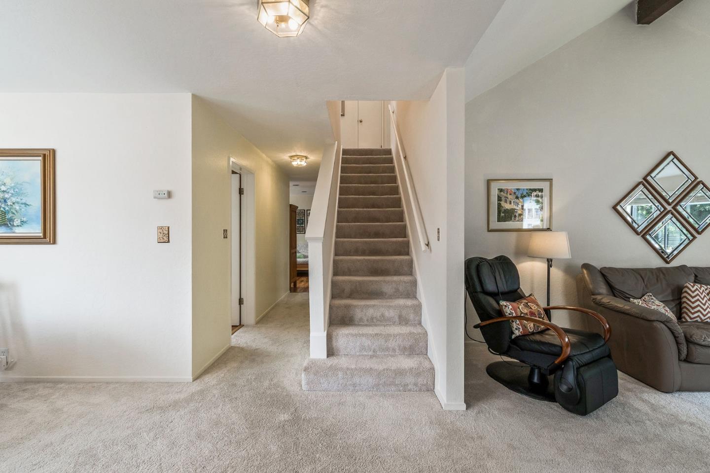 360 Winwood Avenue Pacifica, CA 94044 - Photo 10 of 26 a view of livingroom with furniture and stairs